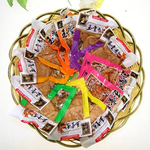 散装称重豆干是怎么实现全自动真空包装的？