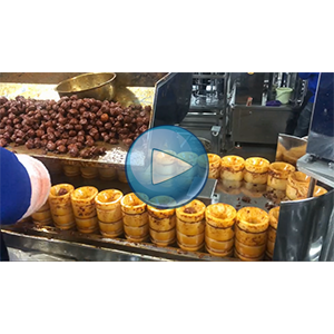 麻辣豆腐给袋真空包装一体机，高速90包/分钟，环形下料器